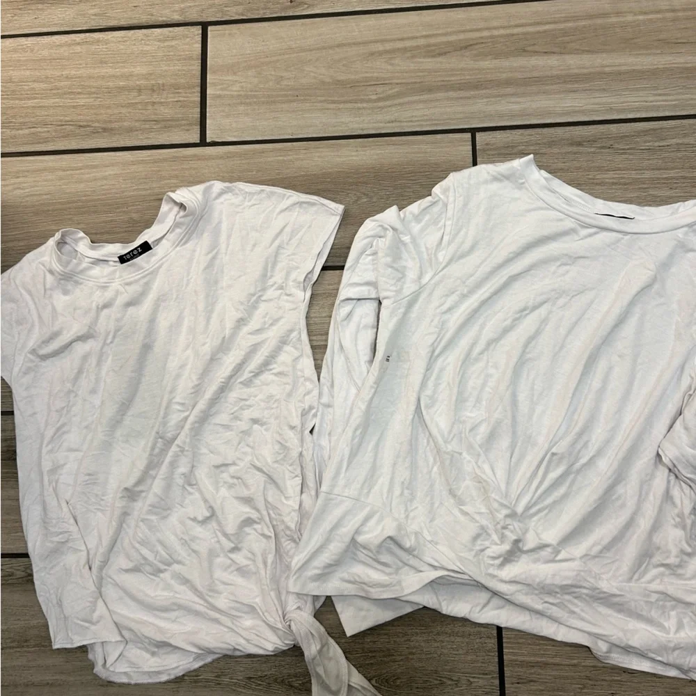 2 new white Terez tops with some light flaws. Girls size XL tie & cross fronts